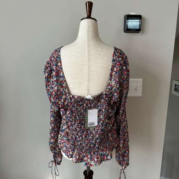 NWT! V-Neck Gather Front and Smocked Back Dainty Floral Top with Ties on Cuff - Picture 6 of 10